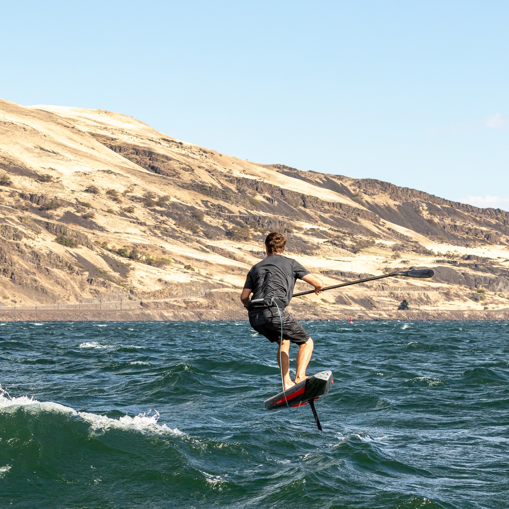 Wing foilers riding swell at Dougs Beach on the Columbia River Gorge