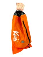 Kaohi V-Dry compression vacuum bag held open by the handle