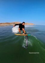 Paul Cooper riding a foil board with One by One x Kaohi foot straps