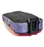 FBC Travel Bag Trolley folded flat with wheels on the end of an FBC RAD travel bag