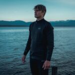 ION Surf Shield cut-resistant rashguard worn by a rider