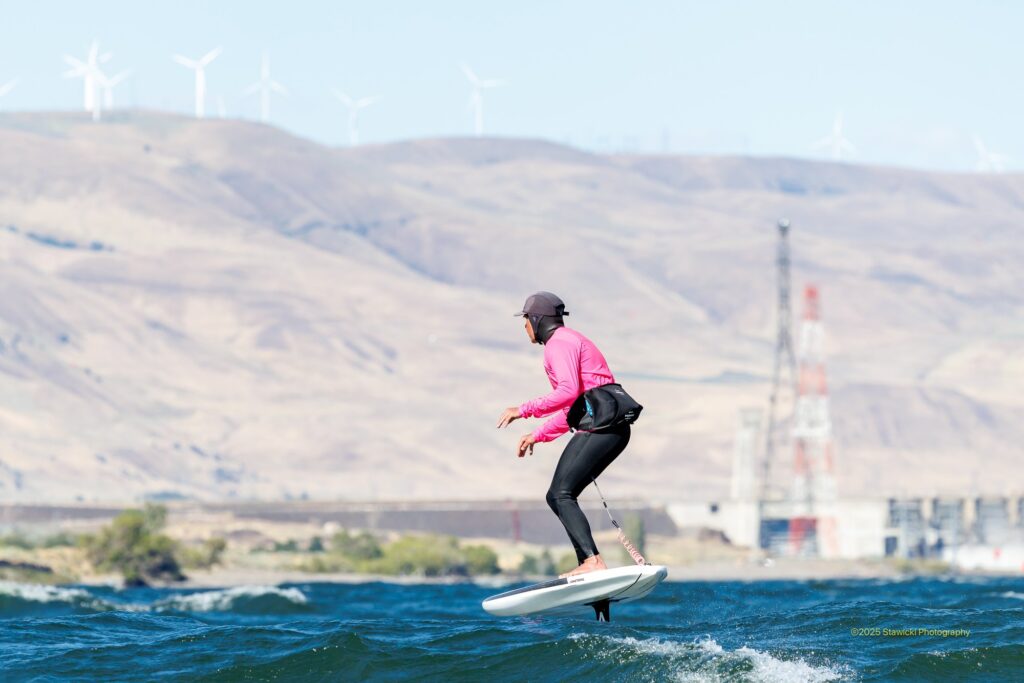 Parawinger in an Armstrong Signal Pink top downwind foiling at Rufus, Oregon. Photo: Bob Stawicki