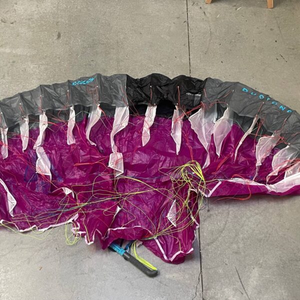Used Duotone Stash V2 parawing 4.0m Purple/Dark Grey laid out on the shop floor
