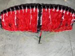 Used Naish Hatch V1 parawing 3.5m Red laid out on the shop floor