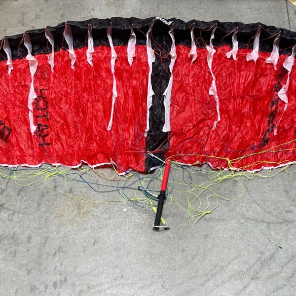 Used Naish Hatch V1 parawing 3.5m Red laid out on the shop floor